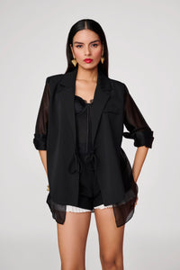 Black Shorts With White Sneak-Peak Pleating Detail