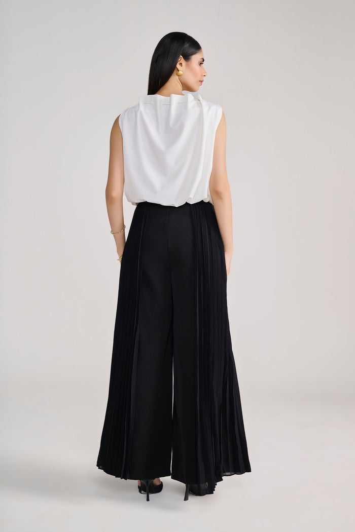 Black pants with side crepe pleated layer