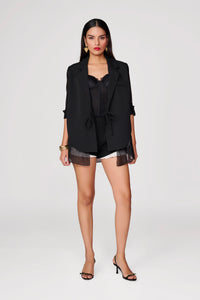 Black Shorts With White Sneak-Peak Pleating Detail